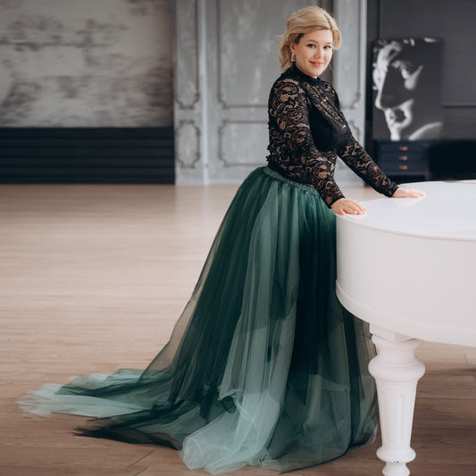 Model wearing seafoam ombré tulle skirt for alternative bridal look or custom photoshoot styling.