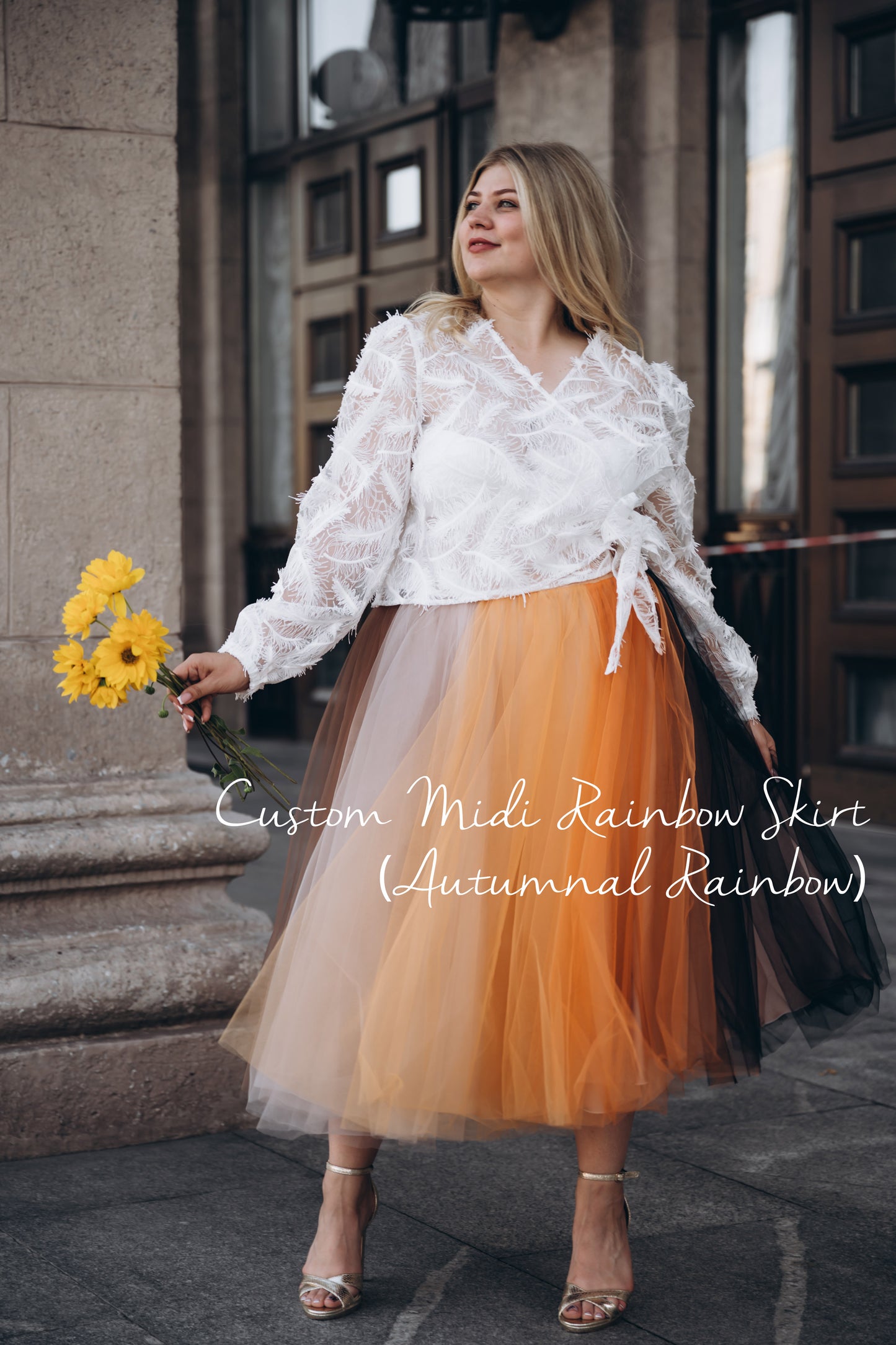 Model wearing custom autumnal colour tulle skirt · warm earthy rainbow palette for weddings, parties, and special celebrations