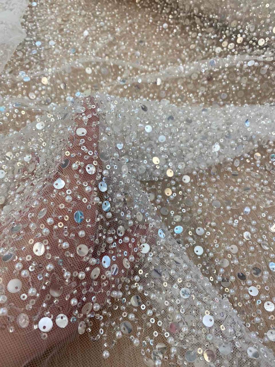 Detail of sheer embellished top – minimalist wedding separates with sparkle.