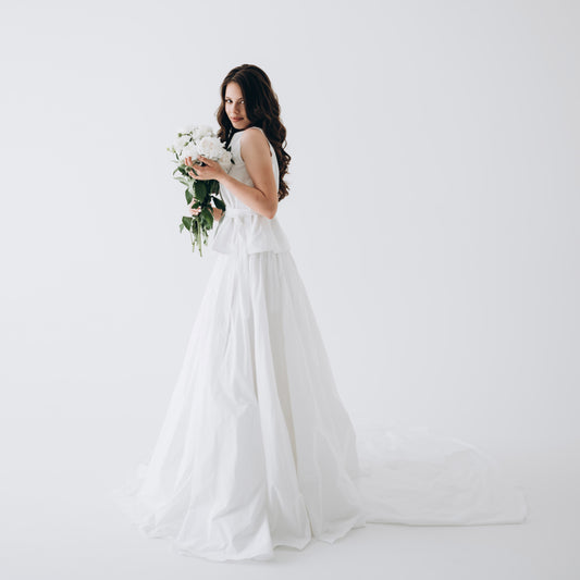 White bridal skirt with train and pockets styled with sleeveless tie-waist top – minimalist bridal separates