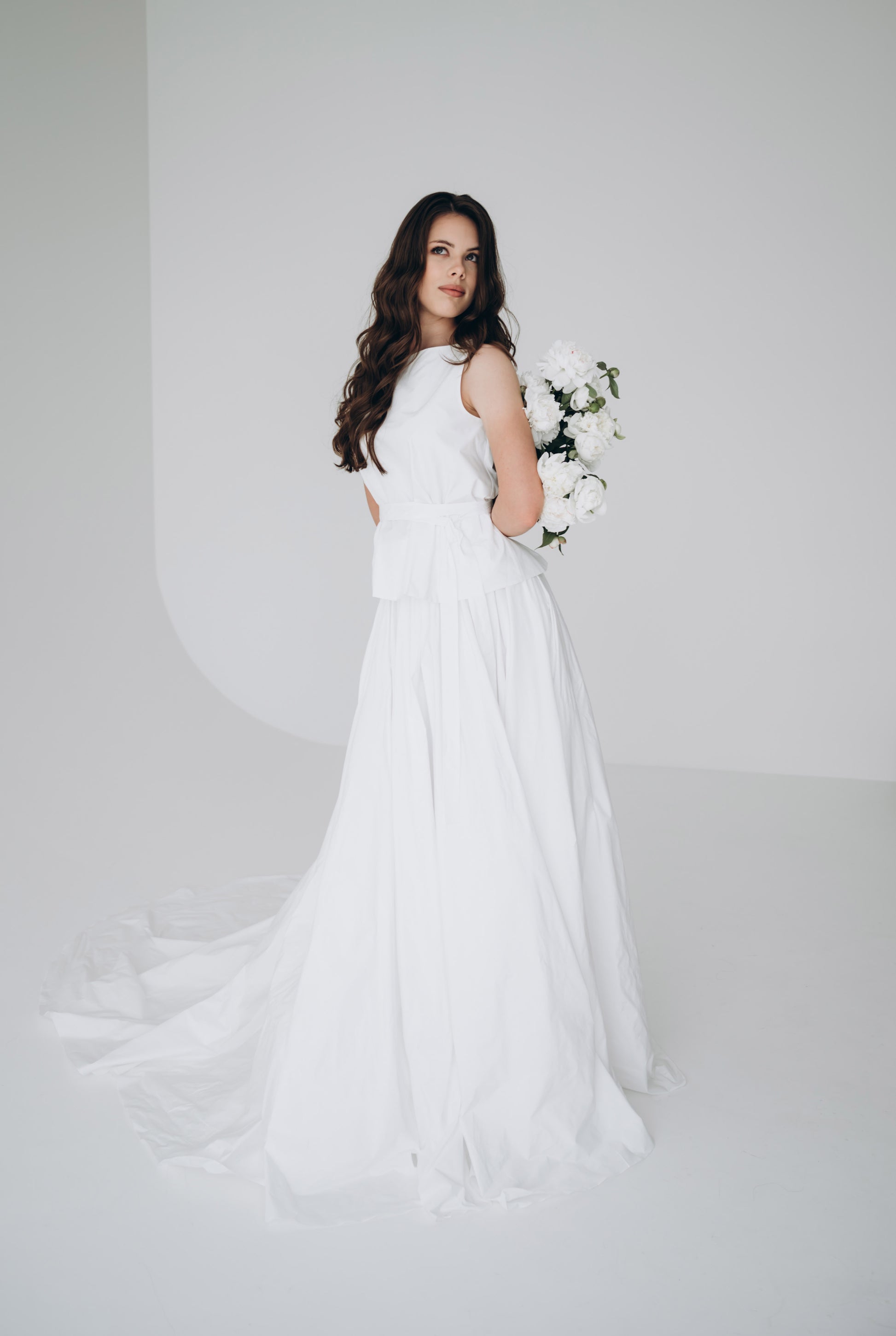 White wedding skirt styled with oversized top for minimalist bridal look