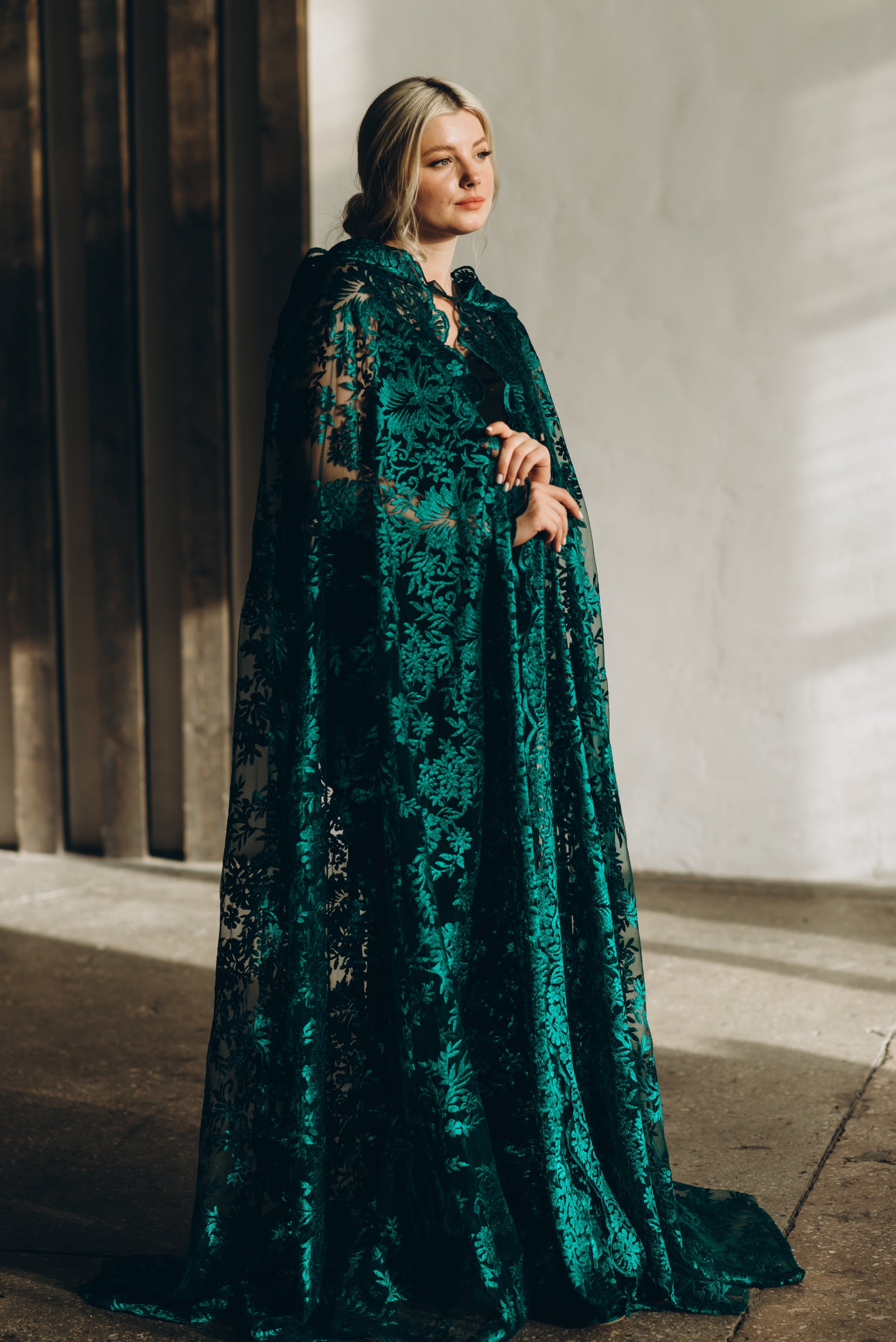 Full-length teal bridal cape with hood and scalloped hem