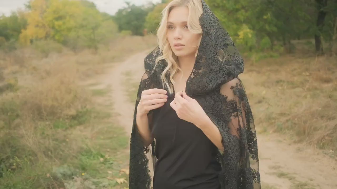Gothic black lace bridal veil with hood styled for outdoor ceremony