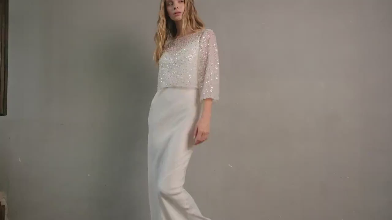 Full-length view of bride in a sheer sequin bridal topper and tailored trousers – bridal separates for contemporary weddings.