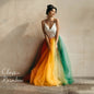 Front view of rainbow wedding skirt with yellow, orange, and teal tulle layers — ideal for same-sex weddings or festival-style brides.