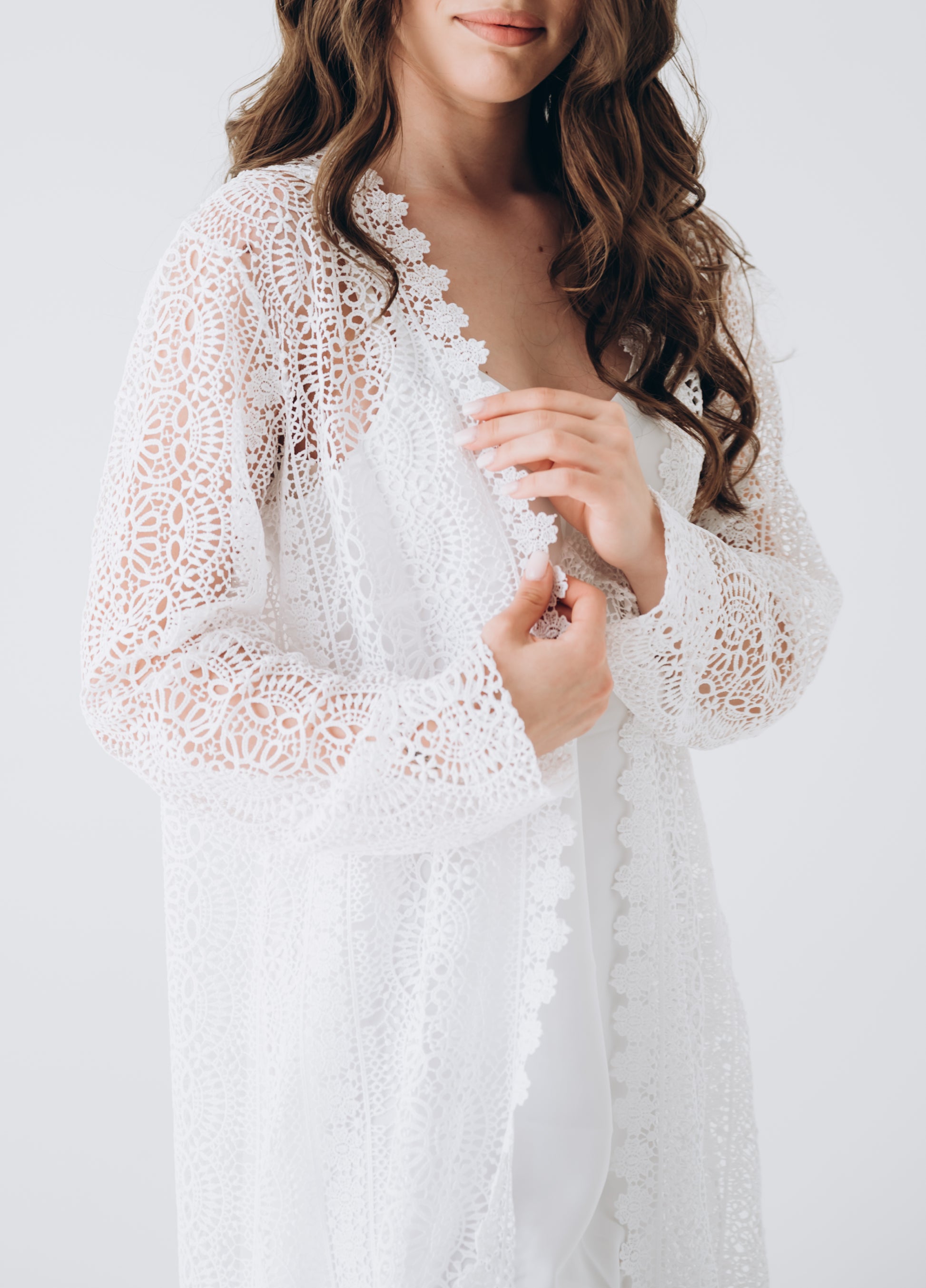 Bride wearing white wedding dress, close up portrait