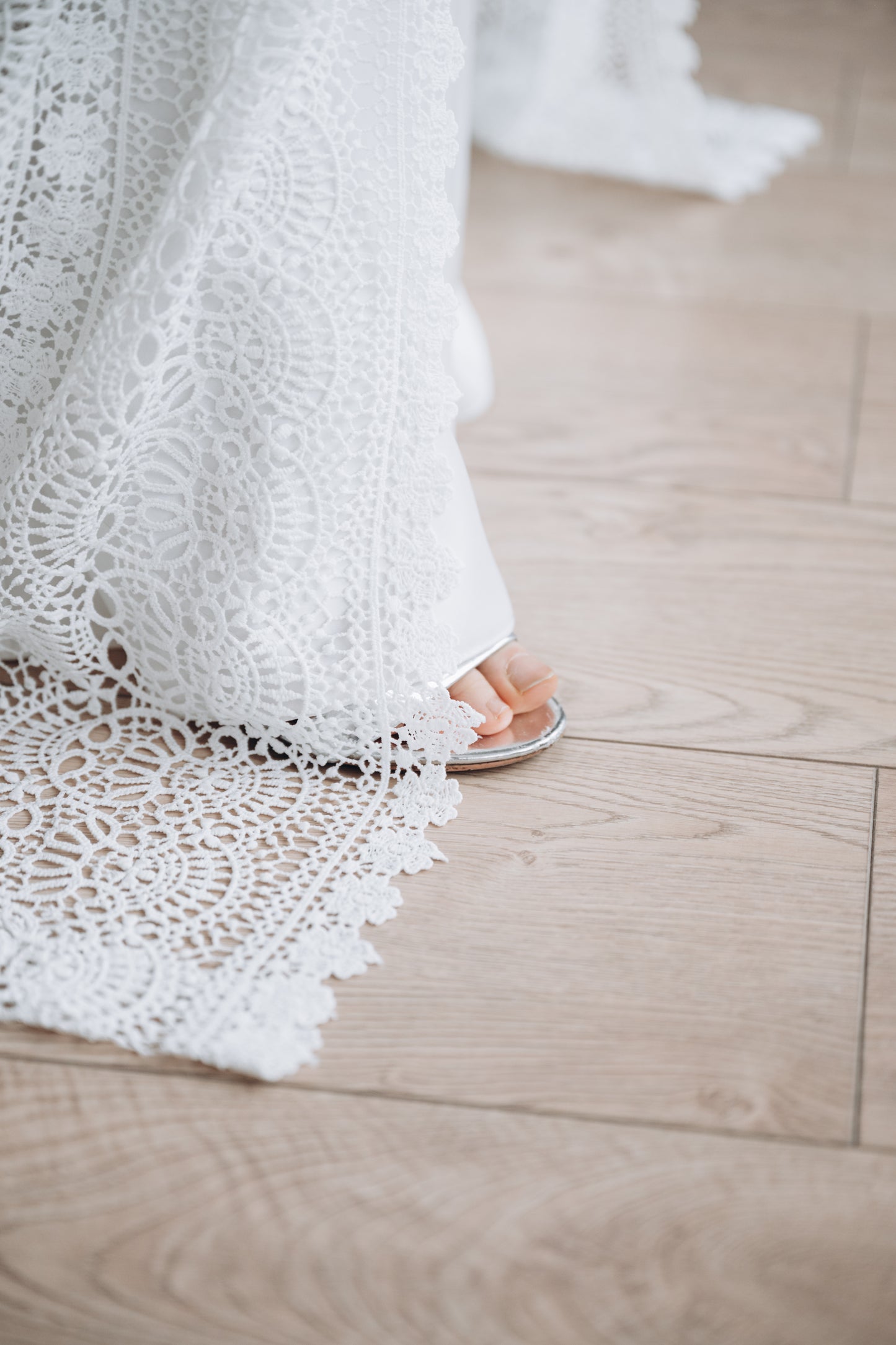 White lace wedding dress, side view