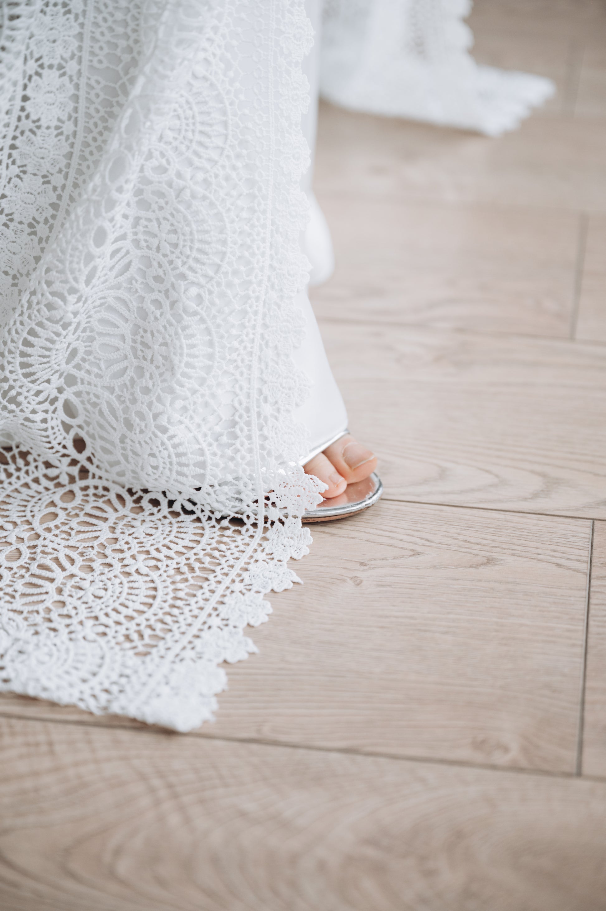 White lace wedding dress, side view