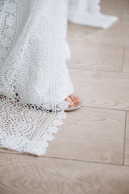 White lace wedding dress, side view