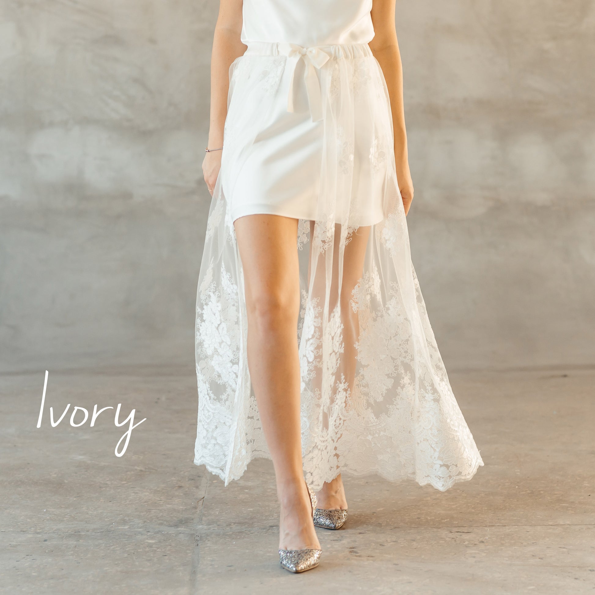 Side view of ivory corded lace skirt tied at the waist, ideal for layering over bridal dresses or creating soft bohemian looks.