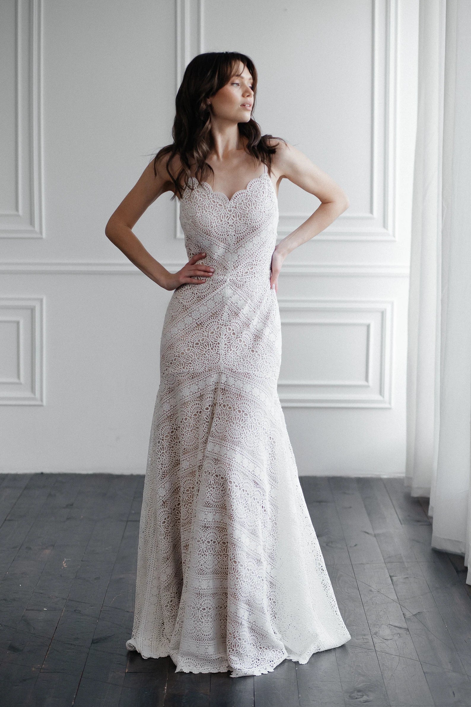 Front view of Liv ivory mer macramé lace wedding dress with fitted mermaid silhouette