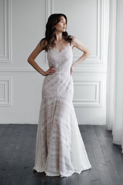 Front view of Liv ivory mer macramé lace wedding dress with fitted mermaid silhouette