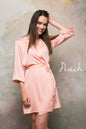 Soft peach satin dressing gown for bride or bridal party, perfect honeymoon cover up