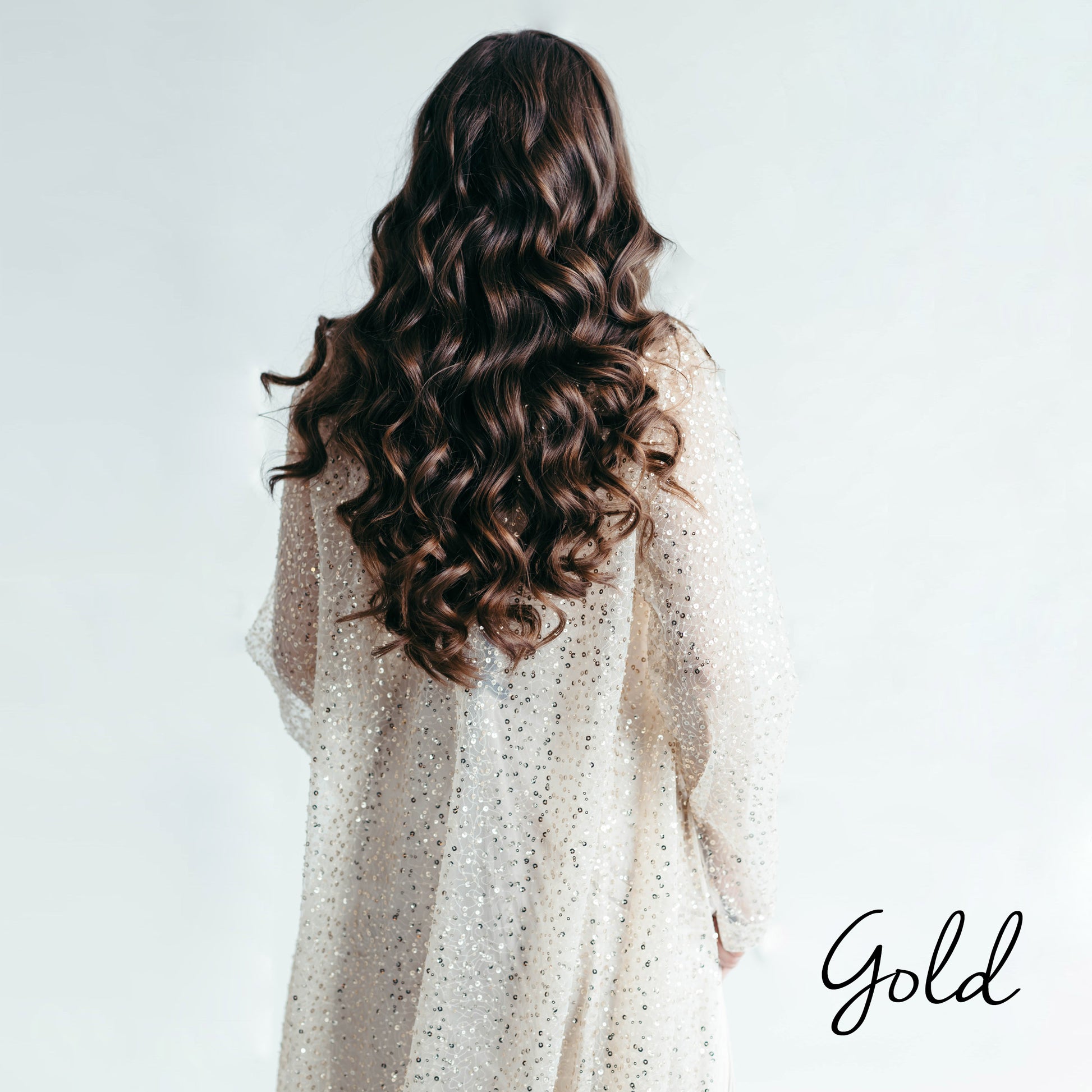 Iona sequin kimono cape, back view, curly hair, studio