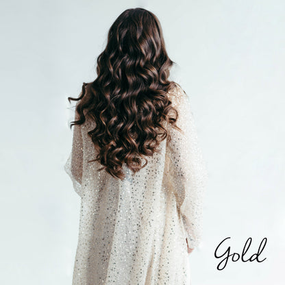 Iona sequin kimono cape, back view, curly hair, studio