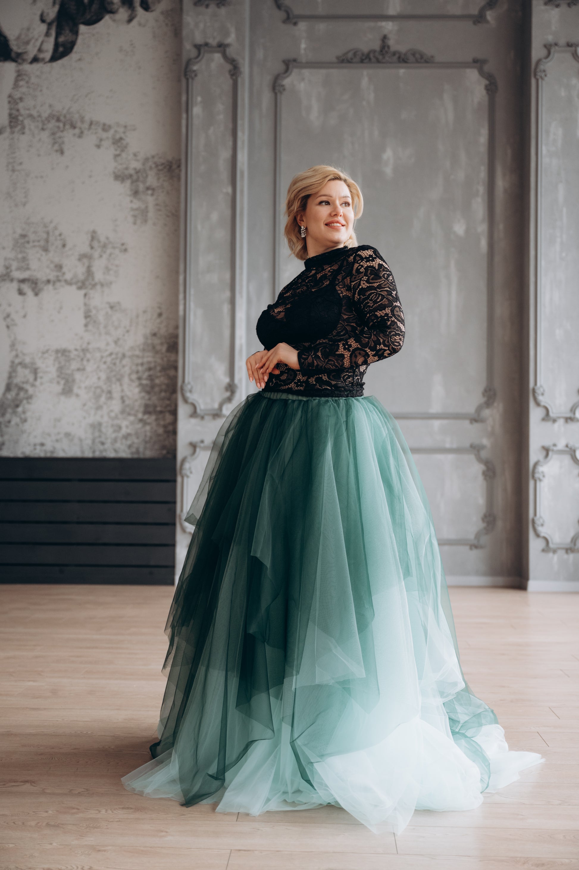 Bride wearing dark green tulle skirt, enchanted forest styling