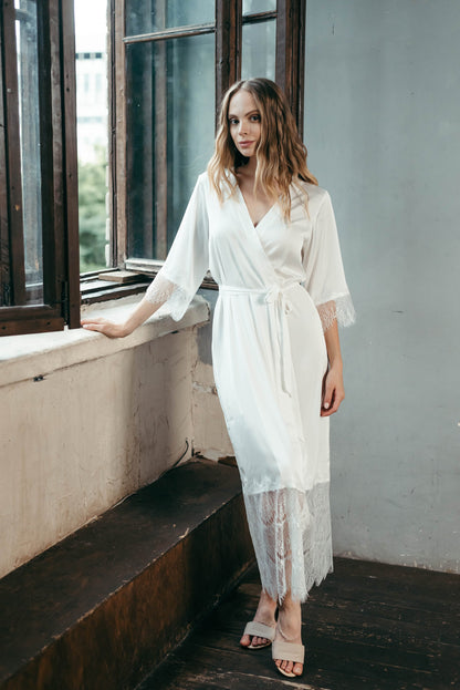 Long lace wedding robe styled for boudoir photoshoot