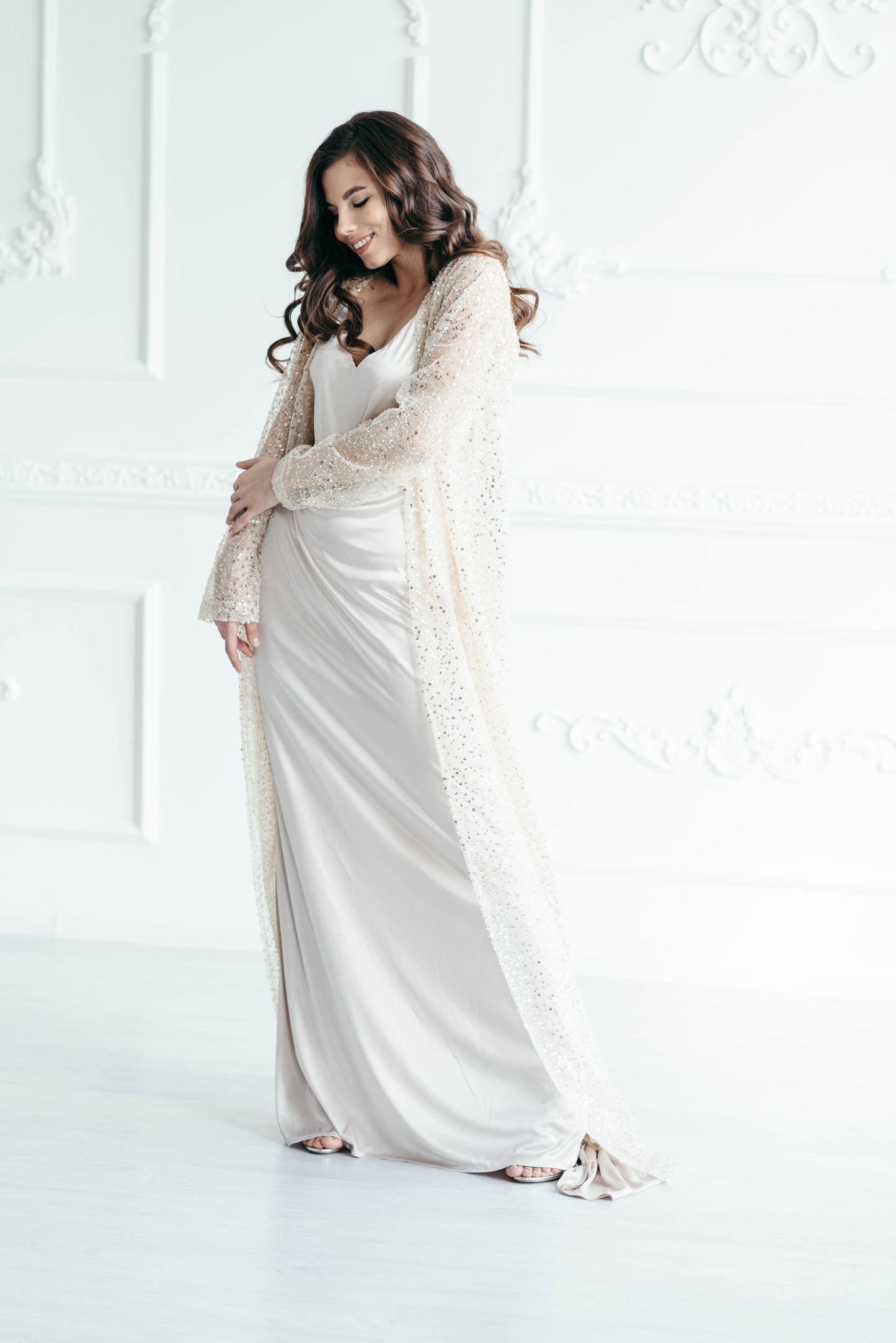 Iona sequin bridal cape, three-quarter view, studio