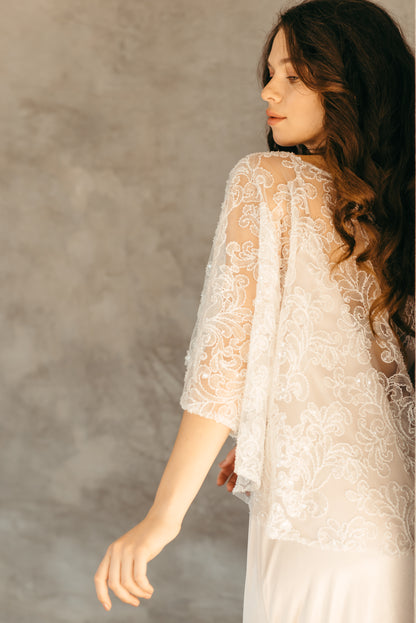 Beaded sequined capelet, sleeve detail and drape