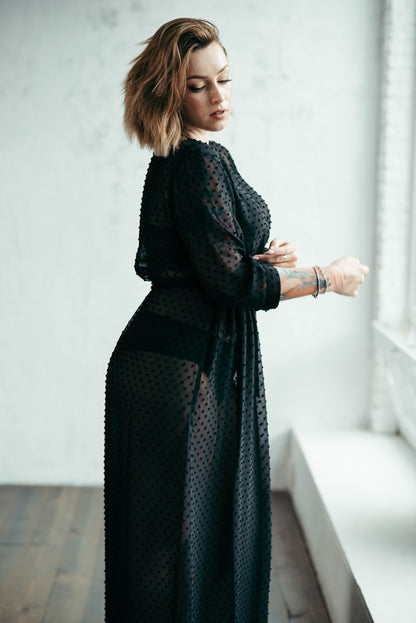 Black sheer polka dot robe, side view by window
