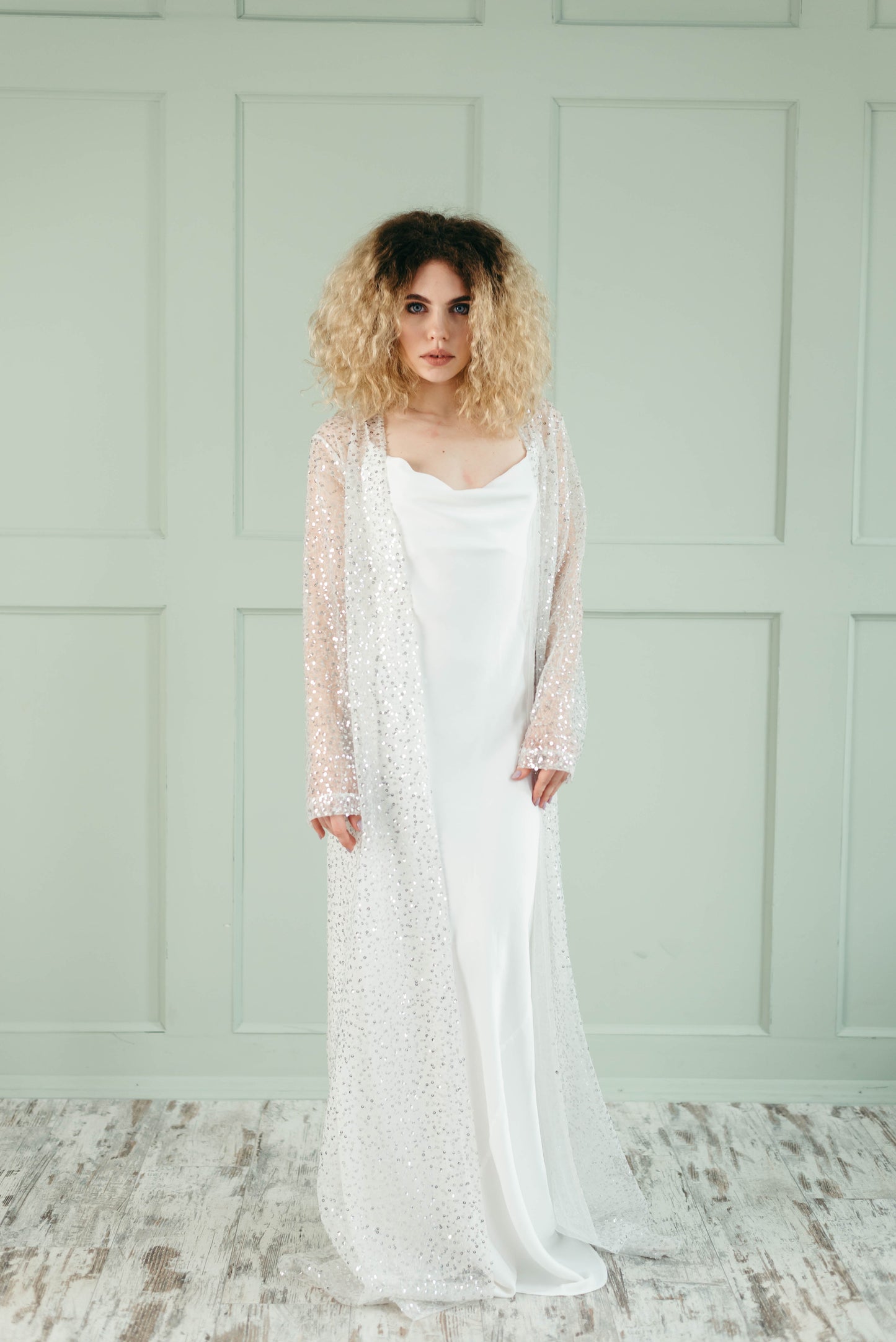 Iona bridal cape, ivory and gold, bright studio, front view