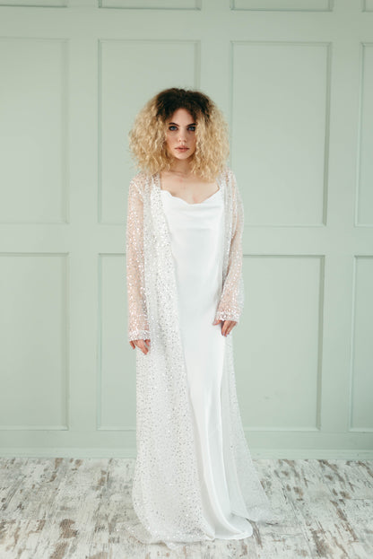 Iona bridal cape, ivory and gold, bright studio, front view