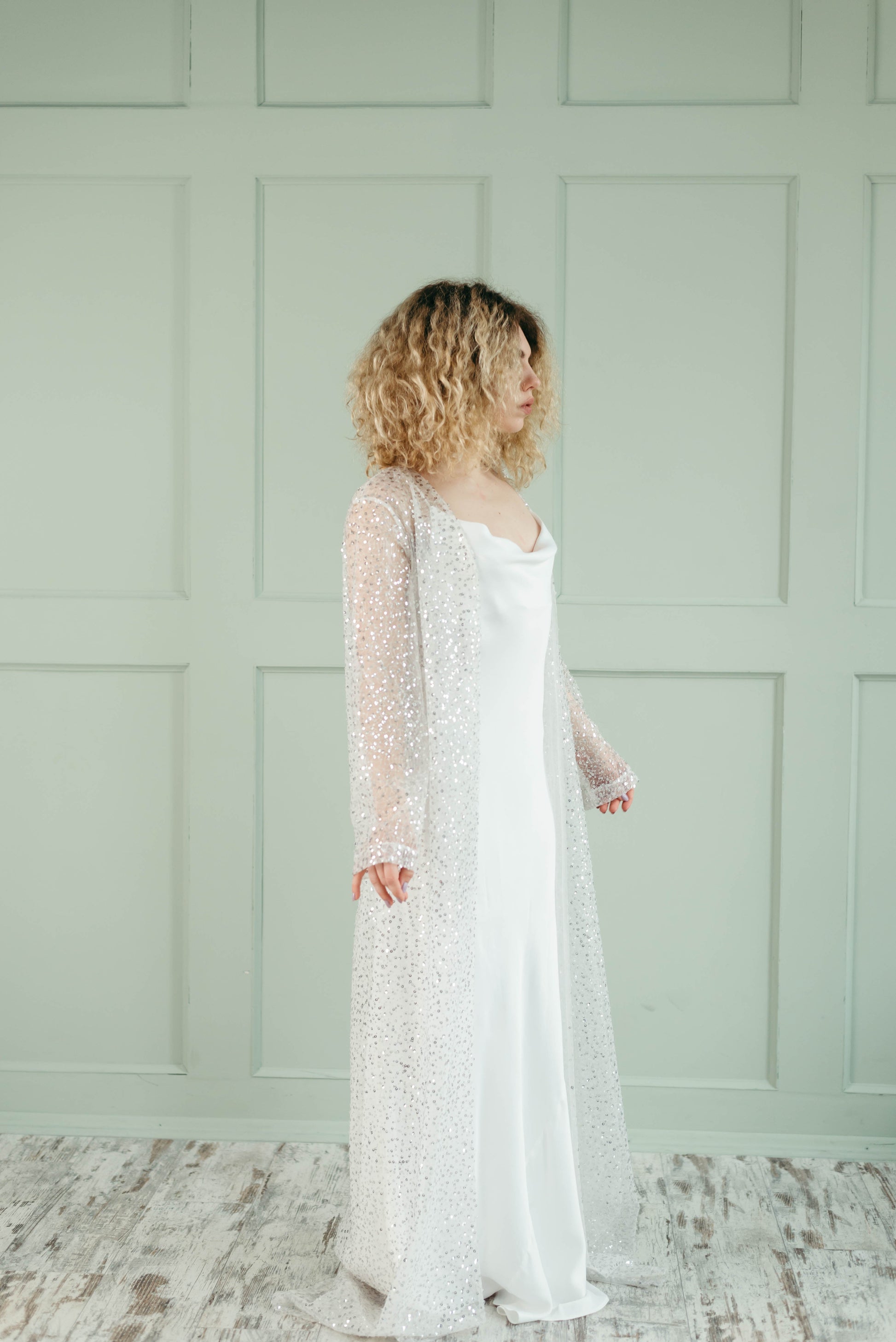 Iona wedding cover up with sleeves, full length side view