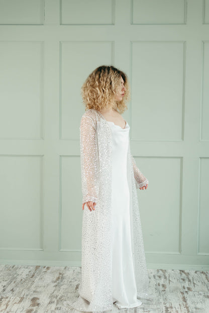 Iona wedding cover up with sleeves, full length side view